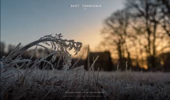 Frozen meadow after sunrise